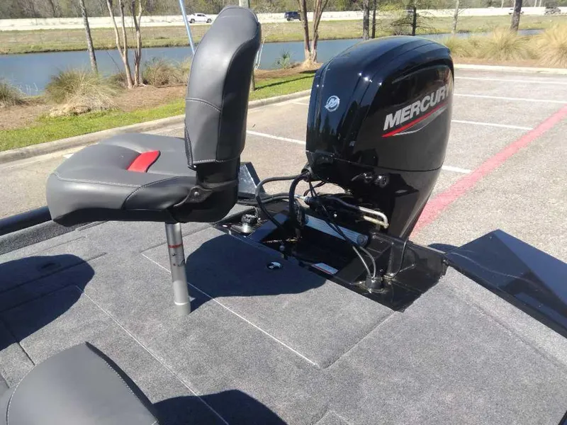 Slide: The Image of 2025 Tracker Pro Team 175 boat with Mercury engine, featuring comfortable seating and sleek design. - 12