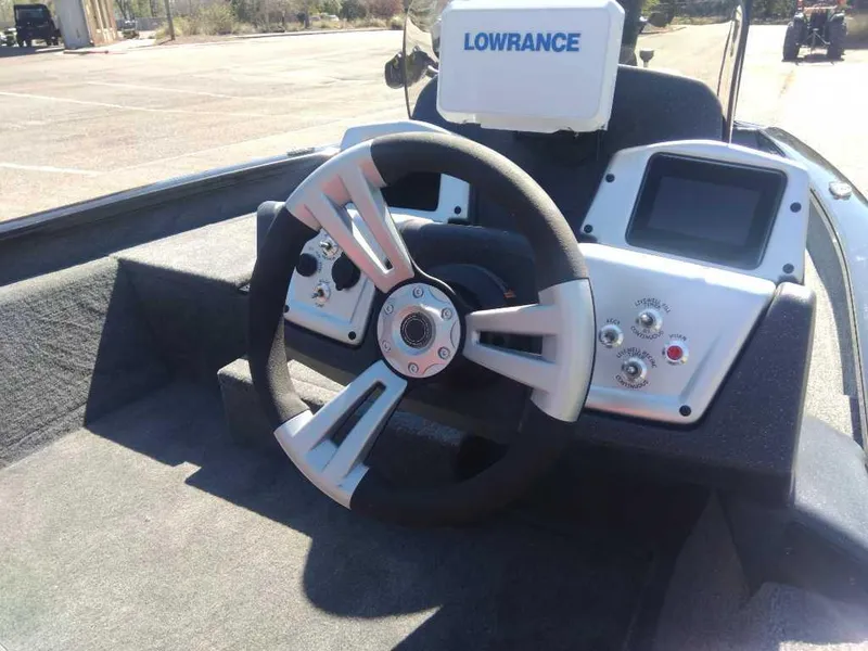 Slide: The Image of Steering console of 2025 Tracker Pro Team 175 boat with Lowrance electronics. - 13