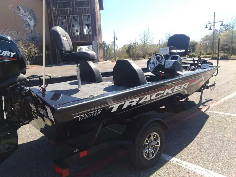 Slide: The Image of 2025 Tracker Pro Team 175 boat in parking lot, featuring sleek design and modern equipment. - 5