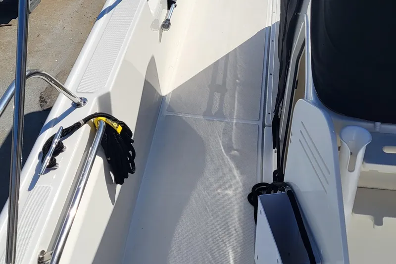 Slide: The Image of 2024 Boston Whaler 210 Montauk boat interior with sleek design and modern features. - 23