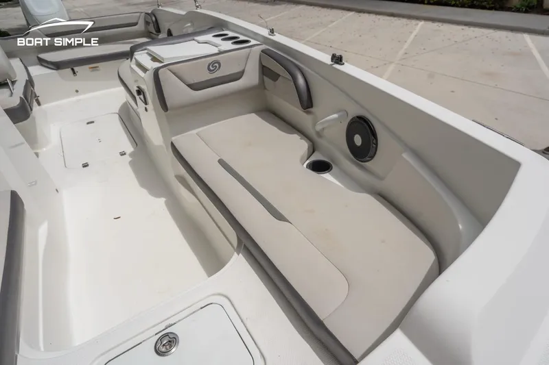Slide: The Image of Interior of 2021 Hurricane SunDeck Sport 205 OB boat, featuring spacious seating and cup holders. - 13