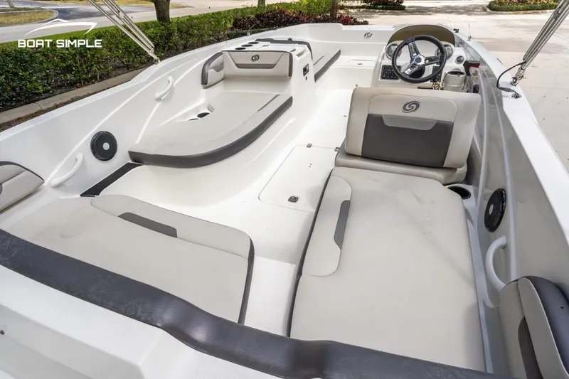 Slide: The Image of 2021 Hurricane SunDeck Sport 205 OB interior with spacious seating and modern design. - 9