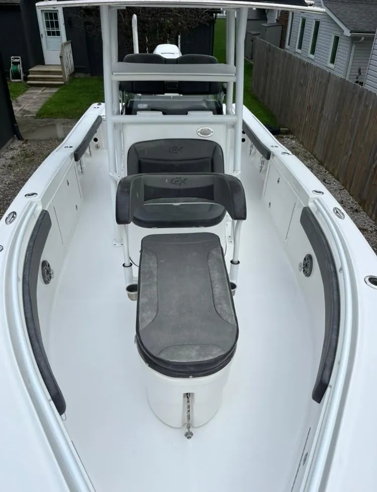 Slide: The Image of 2020 Crevalle 26 HBW boat interior with seating and storage compartments. - 15