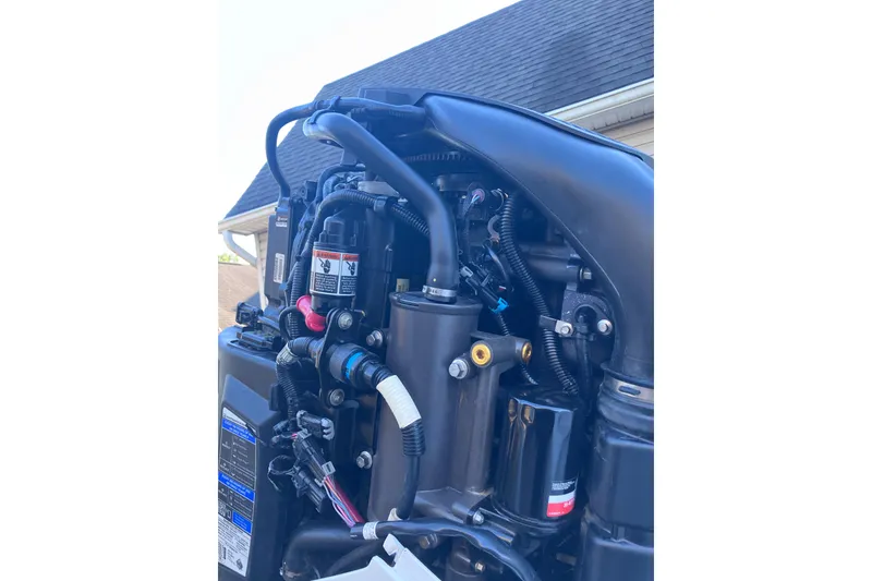 Slide: The Image of Close-up of a 2020 Crevalle 26 HBW boat engine components. - 23