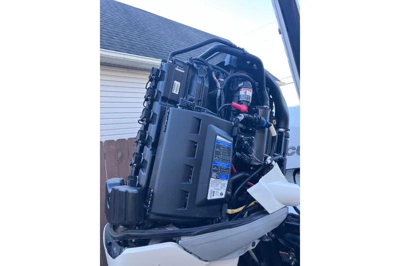 Slide: The Image of Engine of 2020 Crevalle 26 HBW boat, detailed view with components visible. - 25