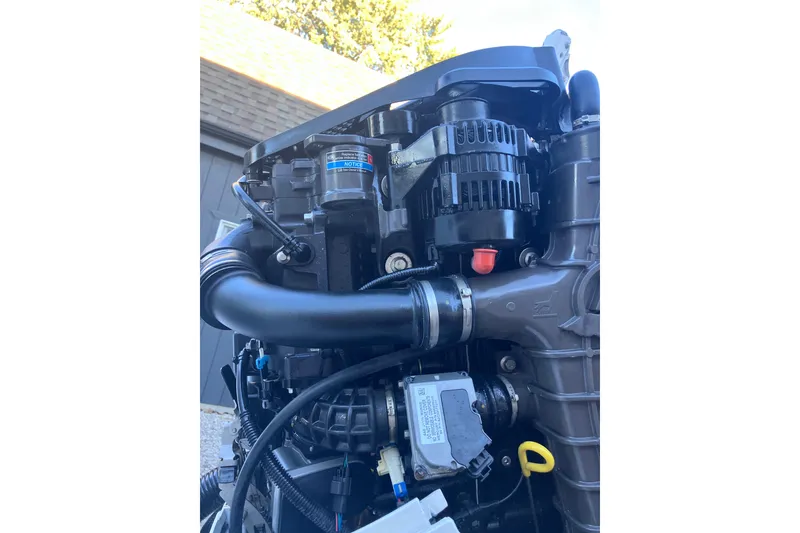 Slide: The Image of Close-up of a 2020 Crevalle 26 HBW boat engine components. - 30