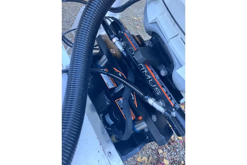 Slide: The Image of Hydraulic steering system of 2020 Crevalle 26 HBW boat, featuring Optimus components. - 32