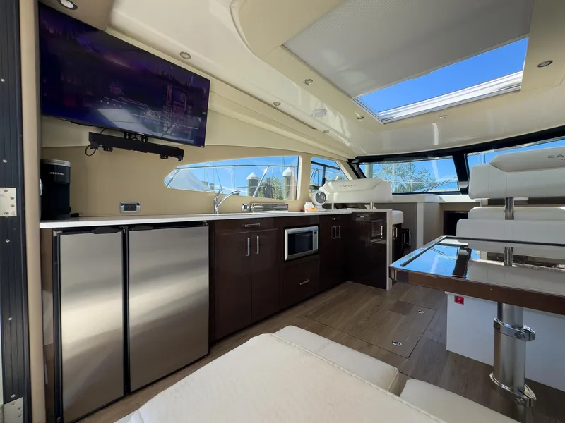 Slide: The Image of Luxurious interior of a 2019 Carver C43 Coupe yacht with modern amenities. - 18