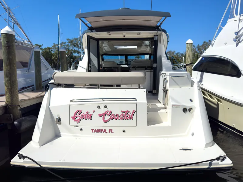 Slide: The Image of A luxurious Carver C43 Coupe yacht docked in Tampa, Florida, 2019 model. - 7