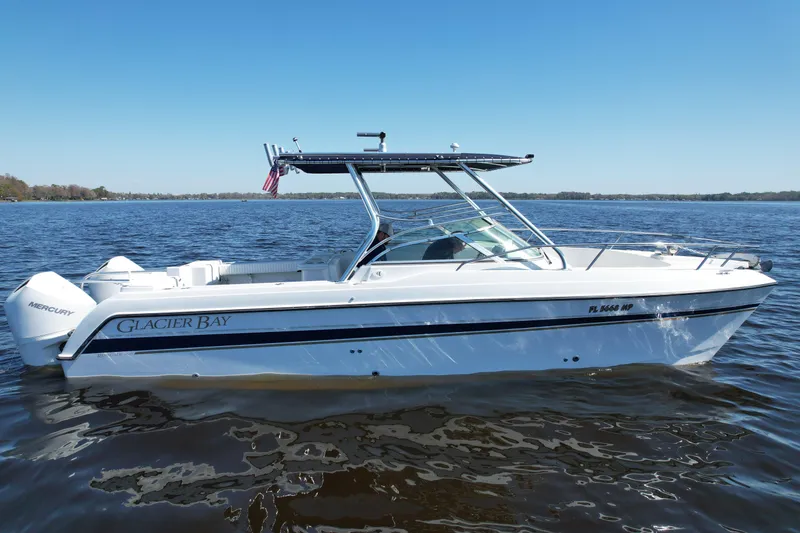 The Image of 2004 Glacier Bay Renegade 2640 boat on calm water, side view. - 0