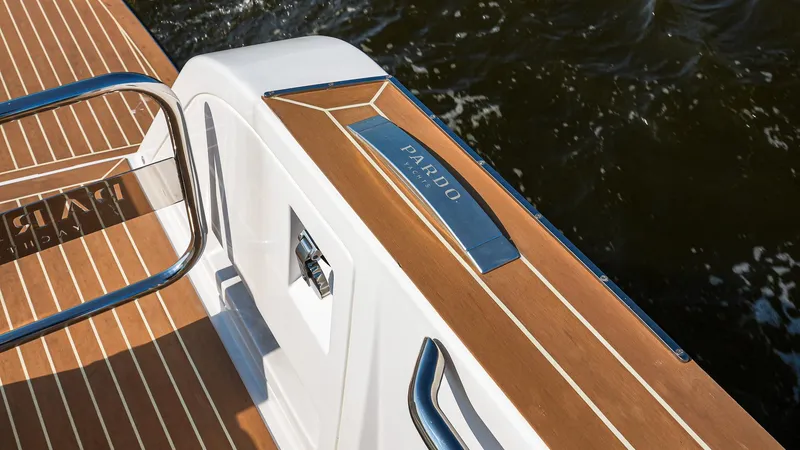 Slide: The Image of 2025 Pardo Yachts 38 Walkaround, teak deck detail, sleek design, luxury boating experience. - 11