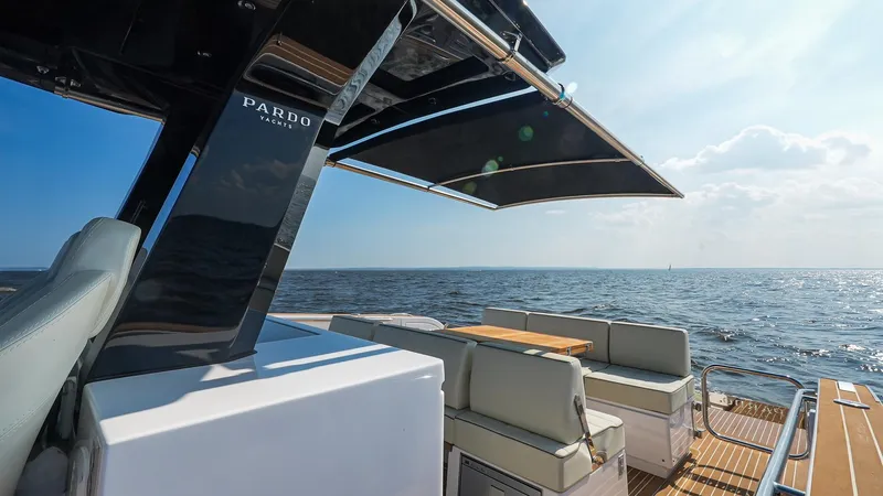 Slide: The Image of 2025 Pardo Yachts 38 Walkaround, luxury deck view, ocean backdrop, sunny day. - 20
