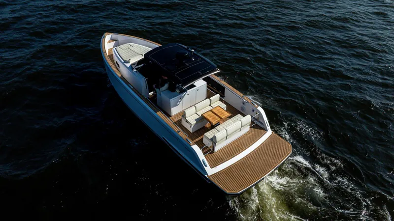 Slide: The Image of 2025 Pardo Yachts 38 Walkaround cruising on open water, showcasing sleek design and luxury features. - 7