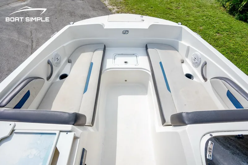 Slide: The Image of 2021 Hurricane SunDeck Sport 205 OB boat interior with spacious seating and storage. - 7