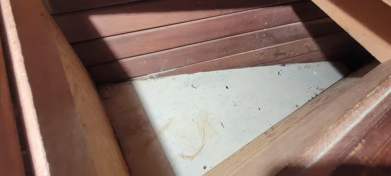 Slide: The Image of Wooden interior of 1980 Shannon 38 Ketch sailboat, showcasing craftsmanship and design. - 15