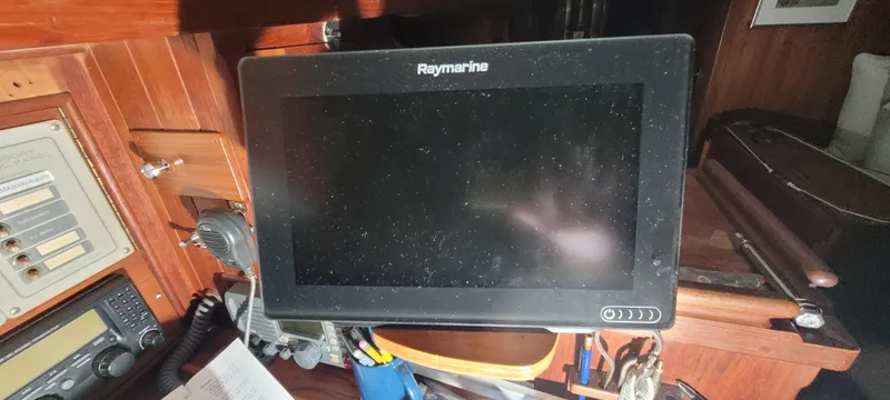 Slide: The Image of Raymarine navigation system on 1980 Shannon 38 Ketch sailboat interior. - 20