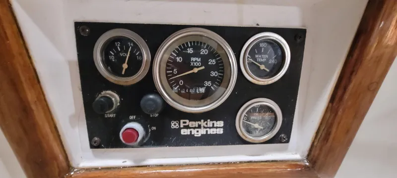 Slide: The Image of Control panel of a 1980 Shannon 38 Ketch with Perkins engine gauges. - 22