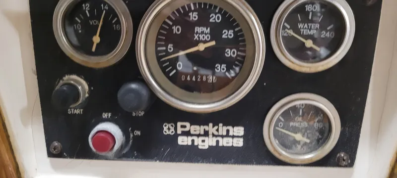Slide: The Image of Control panel of a 1980 Shannon 38 Ketch with Perkins engine gauges. - 26