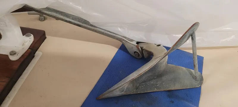 Slide: The Image of Anchor of a 1980 Shannon 38 Ketch sailboat on a blue mat. - 40