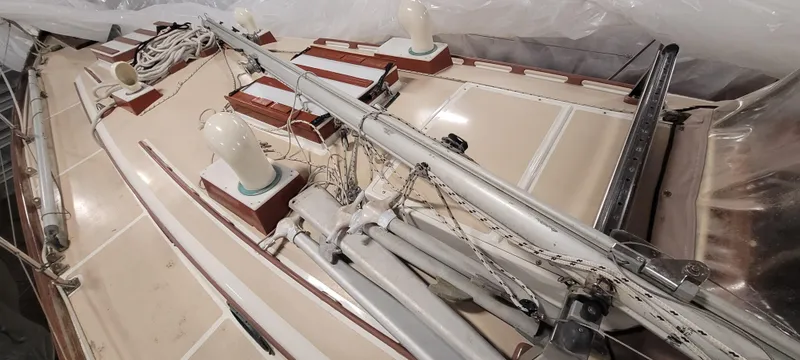 Slide: The Image of 1980 Shannon 38 Ketch sailboat deck with rigging and fittings. - 41