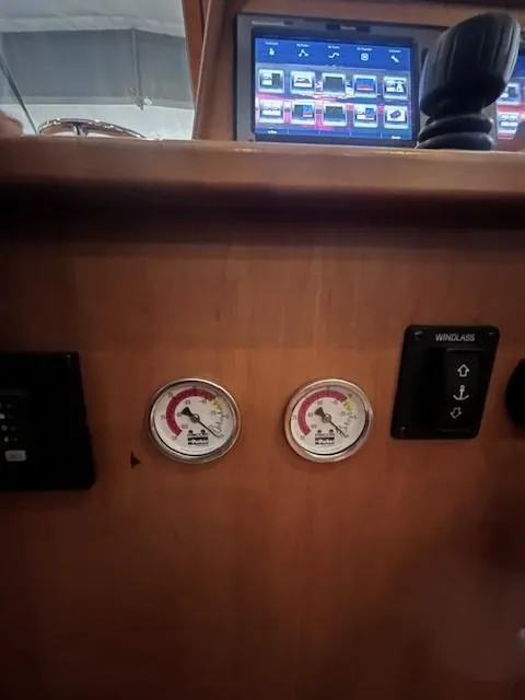 Slide: The Image of 2011 Sabre 40 Sedan dashboard with gauges and controls. - 28