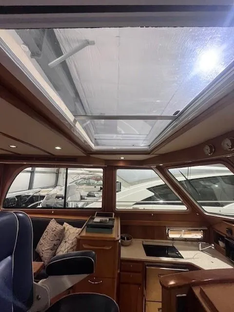 Slide: The Image of Interior of 2011 Sabre 40 Sedan yacht with skylight and modern amenities. - 30