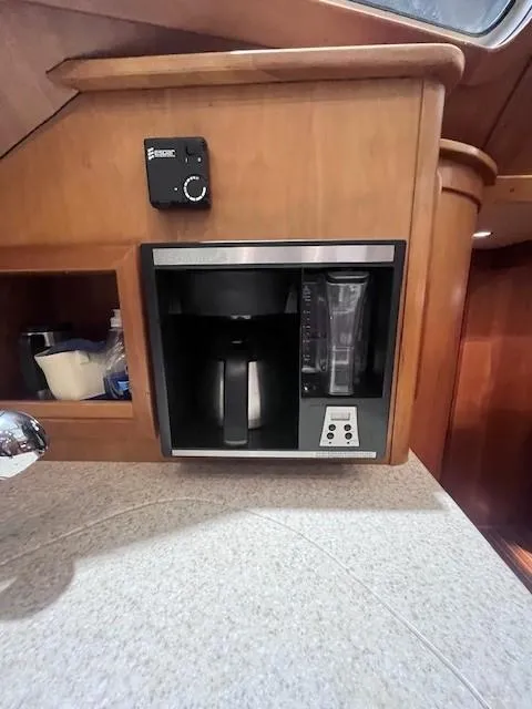 Slide: The Image of Built-in coffee maker in 2011 Sabre 40 Sedan yacht kitchen. - 33