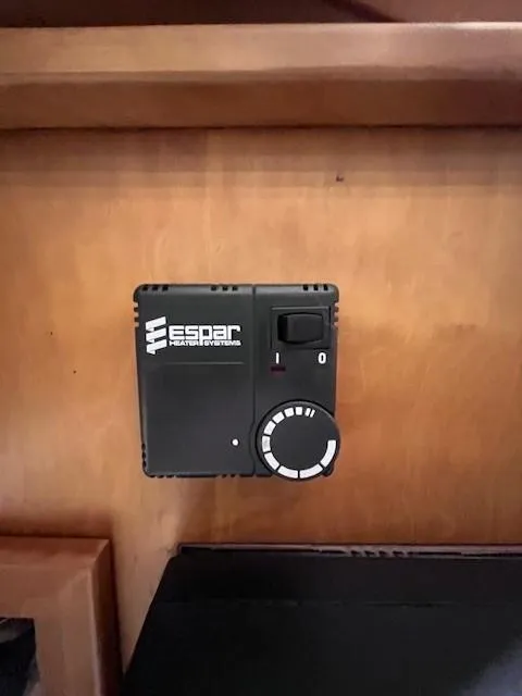 Slide: The Image of Espar heater control panel in a 2011 Sabre 40 Sedan yacht interior. - 34