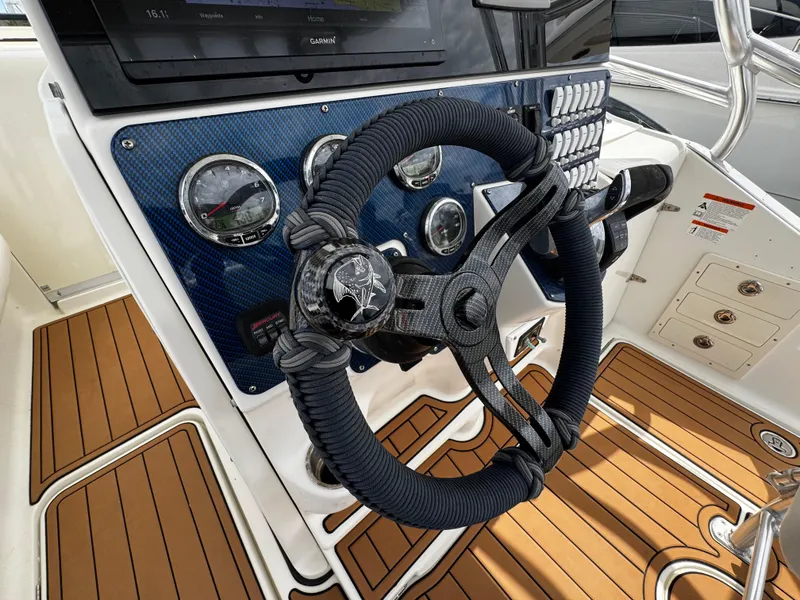 Slide: The Image of 2008 Hydra-Sports Vector 3300 VX helm with gauges and wrapped steering wheel. - 17