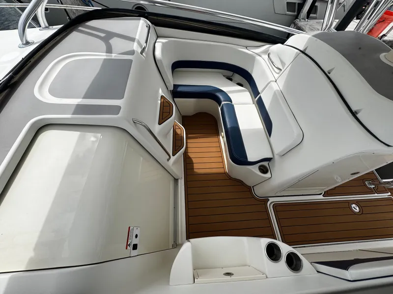 Slide: The Image of 2008 Hydra-Sports Vector 3300 VX boat interior with cushioned seating and wood flooring. - 25