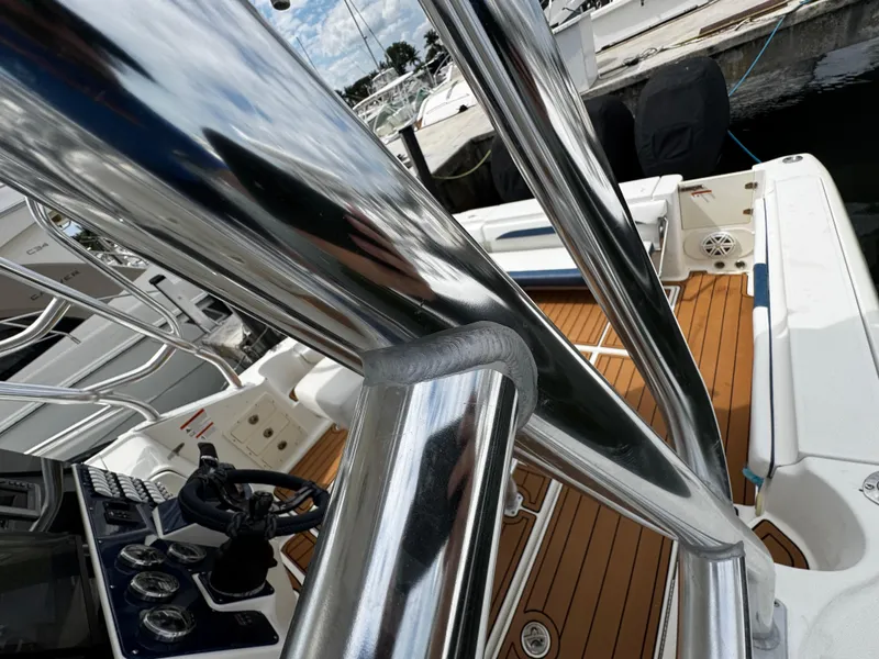 Slide: The Image of 2008 Hydra-Sports Vector 3300 VX boat interior with polished metal and wood accents. - 27