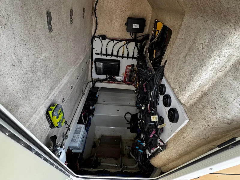 Slide: The Image of 2008 Hydra-Sports Vector 3300 VX interior wiring and equipment compartment. - 29