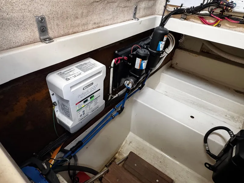 Slide: The Image of 2008 Hydra-Sports Vector 3300 VX boat interior showing electrical components and wiring. - 30