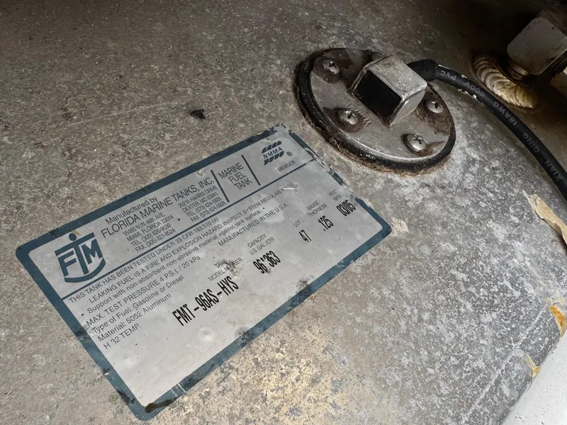 Slide: The Image of 2008 Hydra-Sports Vector 3300 VX fuel tank label, showing specifications and manufacturer details. - 34