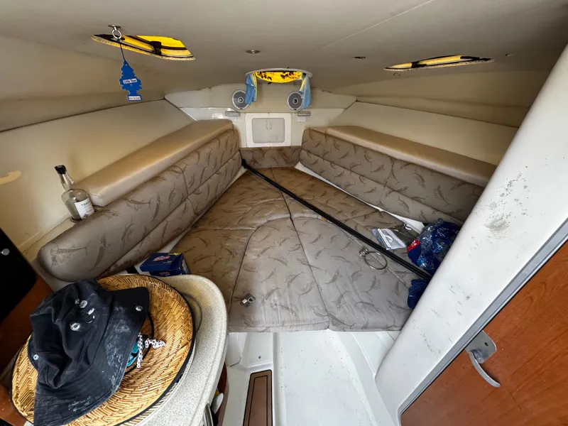 Slide: The Image of 2008 Hydra-Sports Vector 3300 VX cabin interior with seating and personal items. - 36