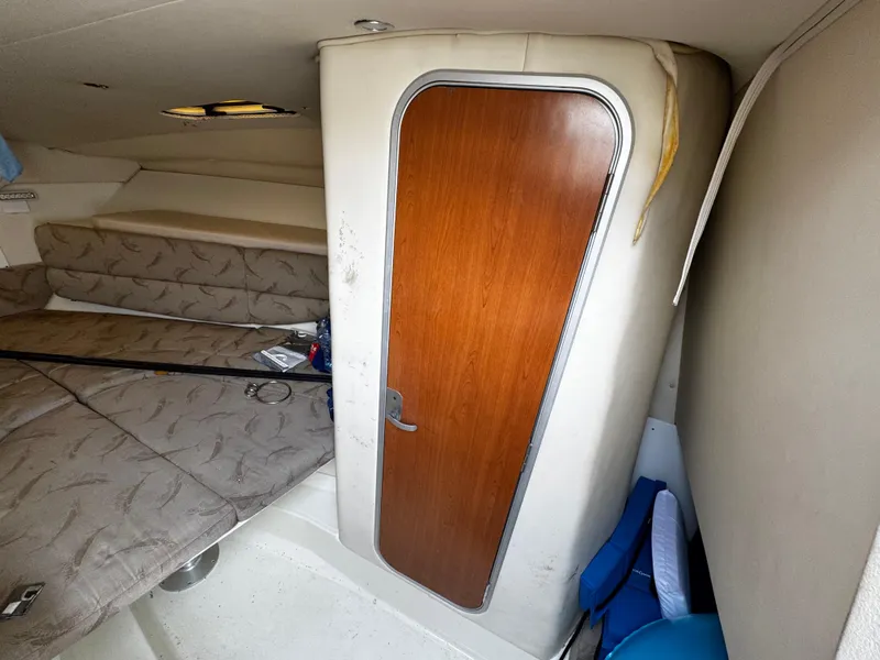 Slide: The Image of 2008 Hydra-Sports Vector 3300 VX cabin interior with wooden door and seating area. - 37