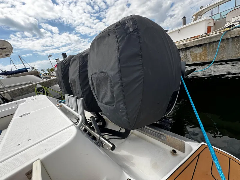 Slide: The Image of 2008 Hydra-Sports Vector 3300 VX boat with covered engines docked at marina. - 4