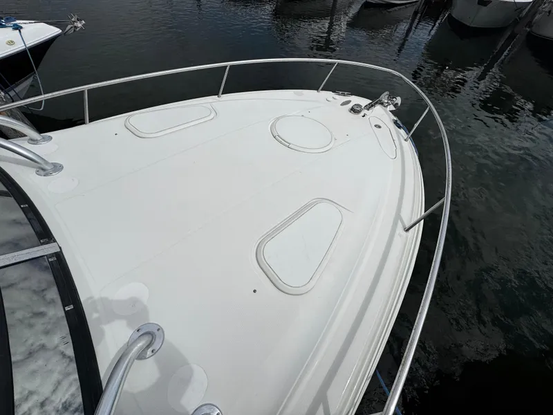Slide: The Image of 2008 Hydra-Sports Vector 3300 VX boat deck, docked in calm waters. - 41