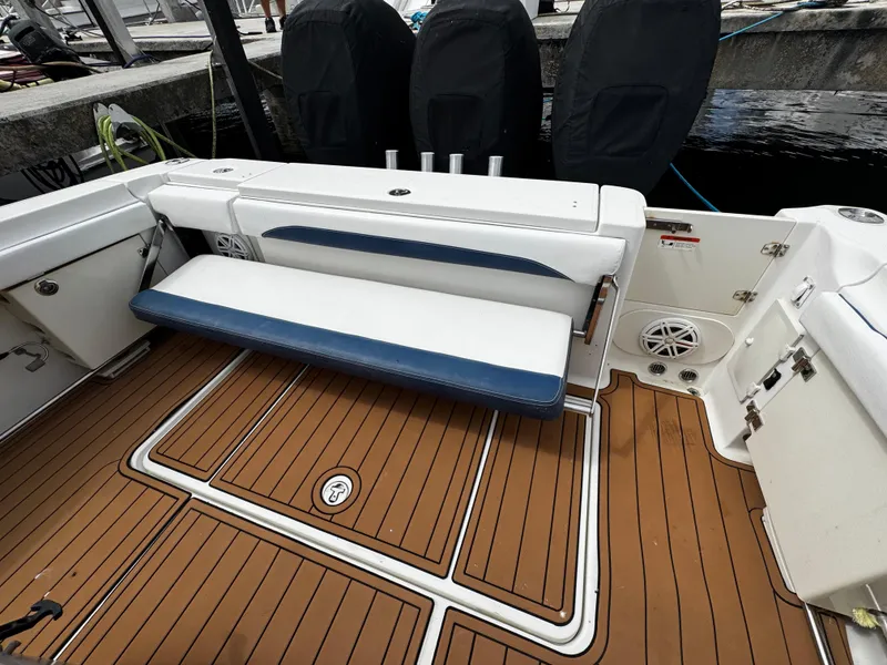 Slide: The Image of 2008 Hydra-Sports Vector 3300 VX boat interior with cushioned seating and teak flooring. - 6