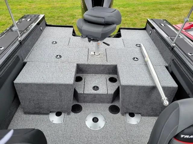 Slide: The Image of 2024 Tracker Targa™ V-19 Combo boat interior with seating and storage compartments. - 14