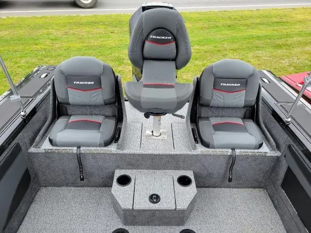 Slide: The Image of 2024 Tracker Targa™ V-19 Combo boat interior with three cushioned seats. - 15