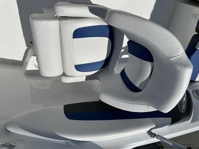 Slide: The Image of 2024 Tahoe 200 S boat seat with white and blue upholstery. - 10