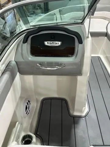 Slide: The Image of 2021 Chaparral 19 SSi boat interior with sleek design and modern features. - 9