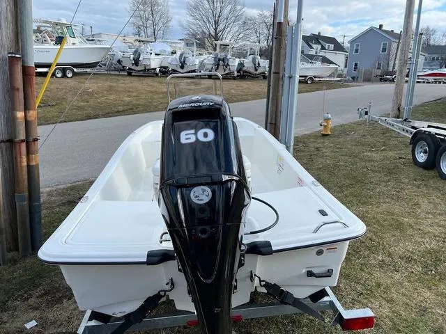 Slide: The Image of 2023 Mako Pro Skiff 15 CC with Mercury 60 engine on trailer. - 7