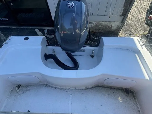 Slide: The Image of 2024 Edgewater 158CS boat with Yamaha outboard motor, viewed from above. - 9