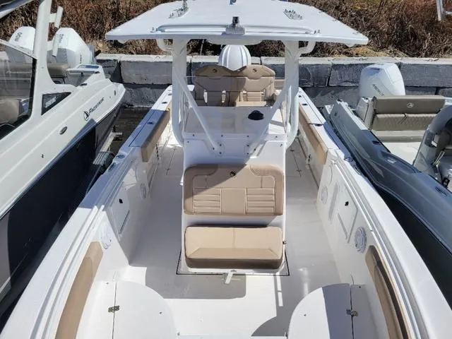 Slide: The Image of 2024 Edgewater 245CC boat with spacious seating and modern design. - 17