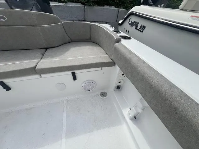 Slide: The Image of Interior of 2025 Sea Hunt Ultra 219 boat with cushioned seating. - 19