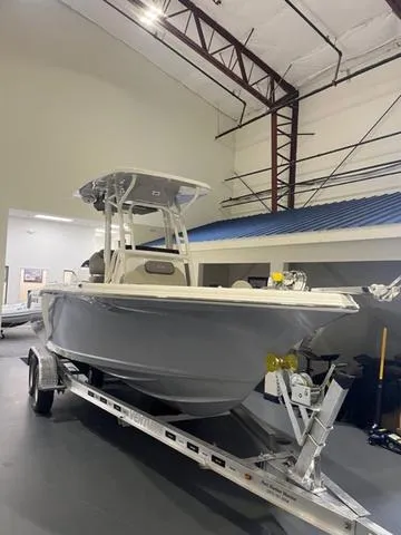 Slide: The Image of 2025 Key West 239 FS boat on trailer in indoor showroom. - 3