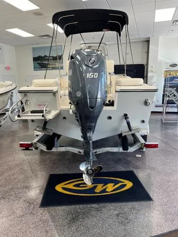 Slide: The Image of 2025 Grady-White Fisherman 180 boat with 150 HP engine in showroom. - 4