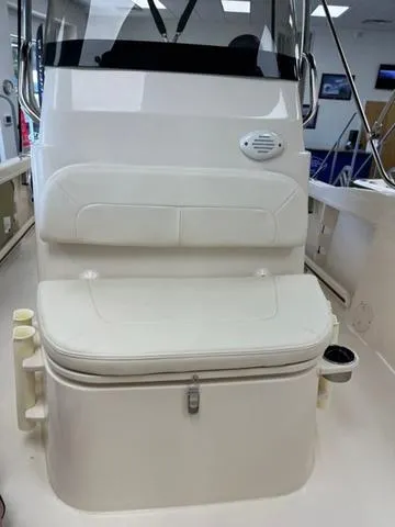 Slide: The Image of 2025 Grady-White Fisherman 180 boat interior with cushioned seating and storage. - 6